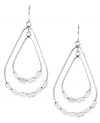 You'll be over the moon for these chic, orbital drops. Kenneth Cole New York's stylish and shiny teardrops feature rectangular bead accents in silver tone mixed metal. Approximate drop: 2 inches. You'll be over the moon for these chic, orbital drops. Kenneth Cole New York's stylish and shiny teardrops feature rectangular bead accents in silver tone mixed metal. Approximate drop: 2 inches.