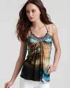 An ocean-inspired print imbues this Sky halter with vivid color while beading at the neckline adds a bohemian touch.