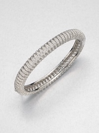 Neat rows of shimmering crystal line up along a slender bangle to wear alone or stack with others.CrystalRhodium platingDiameter, about 2.25Hinged with tongue-and-groove claspImported Neat rows of shimmering crystal line up along a slender bangle to wear alone or stack with others.CrystalRhodium platingDiameter, about 2.25Hinged with tongue-and-groove claspImported
