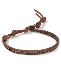 A handsome leather accent enhances your casual cool look with designer flair from Chan Luu. A handsome leather accent enhances your casual cool look with designer flair from Chan Luu.