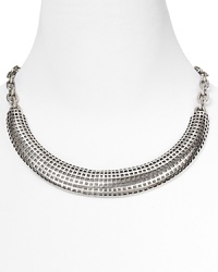 Make edgy your signature with Giles & Brother's perforated silver collar. Worn with a crew neck or strapless dress, this clavicle-grazing accessory adds a cool hit of shine. Make edgy your signature with Giles & Brother's perforated silver collar. Worn with a crew neck or strapless dress, this clavicle-grazing accessory adds a cool hit of shine.
