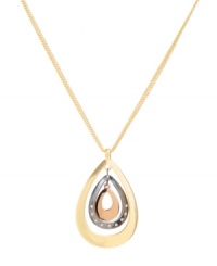 Intergalactic glamour. Kenneth Cole New York's stunning orbital-style pendant includes rows of silver, gold, and bronze-plated mixed metal with sparkling crystal accents. Approximate length: 16 inches + 3-inch extender. Approximate drop: 2 inches. Intergalactic glamour. Kenneth Cole New York's stunning orbital-style pendant includes rows of silver, gold, and bronze-plated mixed metal with sparkling crystal accents. Approximate length: 16 inches + 3-inch extender. Approximate drop: 2 inches.