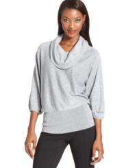 Style&co.'s shimmering petite cowlneck sweater looks lovely with a metallic finish and a sleek silhouette. Style&co.'s shimmering petite cowlneck sweater looks lovely with a metallic finish and a sleek silhouette.