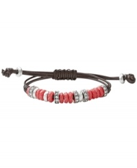 Spruce up your summer look in Fossil's bright bracelet. Strung from a brown leather cord, reconstituted jade beads in dyed watermelon combine with sparkling crystals for a lively look. Set in silver tone mixed metal. Bracelet adjusts to fit wrist. Approximate diameter: 2-1/2 inches. Spruce up your summer look in Fossil's bright bracelet. Strung from a brown leather cord, reconstituted jade beads in dyed watermelon combine with sparkling crystals for a lively look. Set in silver tone mixed metal. Bracelet adjusts to fit wrist. Approximate diameter: 2-1/2 inches.