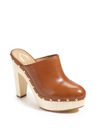 THE LOOKOval toeGoldtone nailhead accentsWooden heel and platformPadded insoleTHE FITWooden heel 4½ (115mm)Wooden platform, 1¼ (30mm)Compares to a 3¼ heel (80mm)THE MATERIALLeather upperLeather lining and soleORIGINImported THE LOOKOval toeGoldtone nailhead accentsWooden heel and platformPadded insoleTHE FITWooden heel 4½ (115mm)Wooden platform, 1¼ (30mm)Compares to a 3¼ heel (80mm)THE MATERIALLeather upperLeather lining and soleORIGINImported