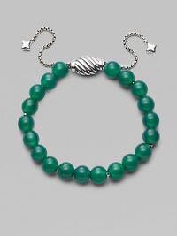 Rich green onyx is fastened by an adjustable clasp of sterling silver.Green onyx Sterling silver Bead diameter, about ¾ Imported Rich green onyx is fastened by an adjustable clasp of sterling silver.Green onyx Sterling silver Bead diameter, about ¾ Imported