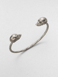 A Swarovski crystal accented style with an iconic skull design. Swarovski crystalSilverplated brassDiameter, about 2Slip-on styleMade in Italy A Swarovski crystal accented style with an iconic skull design. Swarovski crystalSilverplated brassDiameter, about 2Slip-on styleMade in Italy