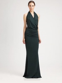 A style that defines effortless elegance, with flattering side ruching and a stunning halter silhouette.Surplice necklineSide ruchingPull-on styleFlared hemAbout 62 from shoulder to hemFully lined68% acetate/27% polyester/5% spandexDry cleanMade in USA of imported fabricModel shown is 5'10 (177cm) wearing US size 4. A style that defines effortless elegance, with flattering side ruching and a stunning halter silhouette.Surplice necklineSide ruchingPull-on styleFlared hemAbout 62 from shoulder to hemFully lined68% acetate/27% polyester/5% spandexDry cleanMade in USA of imported fabricModel shown is 5'10 (177cm) wearing US size 4.