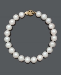 Create a look of ultimate sophistication. Decorate your wrist with this traditional bracelet crafted with AA+ cultured freshwater pearls (8-9 mm) and a 14k gold clasp. Approximate length: 8 inches. Create a look of ultimate sophistication. Decorate your wrist with this traditional bracelet crafted with AA+ cultured freshwater pearls (8-9 mm) and a 14k gold clasp. Approximate length: 8 inches.