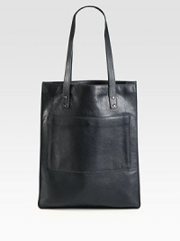 Sleek, supple leather tote designed to carry your tech essentials and more.Double shoulder straps, 11 dropTop zip closureOutside snap pocketInside zip pocketThree tech compartmentsFabric & leather lining13.25W X 16.25H X 3DImported Sleek, supple leather tote designed to carry your tech essentials and more.Double shoulder straps, 11 dropTop zip closureOutside snap pocketInside zip pocketThree tech compartmentsFabric & leather lining13.25W X 16.25H X 3DImported