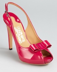 In the glossiest patent leather, these Salvatore Ferragamo pumps boast a juicy hue with playful style. In the glossiest patent leather, these Salvatore Ferragamo pumps boast a juicy hue with playful style.