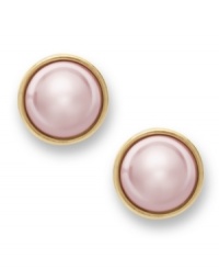 Perfection in pink. Charter Club's sophisticated stud earrings feature simulated pink pearls in a gold tone mixed metal bezel setting and post backing. Approximate diameter: 1 inch. Perfection in pink. Charter Club's sophisticated stud earrings feature simulated pink pearls in a gold tone mixed metal bezel setting and post backing. Approximate diameter: 1 inch.