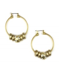 A classic hoop style with a modern twist. Jones New York's chic earrings feature textured and smooth rondells in a gold tone mixed metal setting. Approximate diameter: 1/2 inch. A classic hoop style with a modern twist. Jones New York's chic earrings feature textured and smooth rondells in a gold tone mixed metal setting. Approximate diameter: 1/2 inch.