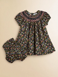 Tailored in airy cotton for a gently flowing silhouette, a darling short-sleeved floral-print dress is beautifully complemented with a smocked neckline and embroidery. Round smocked necklineShort puffed sleevesBack buttonsFull skirtRuffled hemCottonHand washImported Please note: Number of buttons may vary depending on size ordered. Tailored in airy cotton for a gently flowing silhouette, a darling short-sleeved floral-print dress is beautifully complemented with a smocked neckline and embroidery. Round smocked necklineShort puffed sleevesBack buttonsFull skirtRuffled hemCottonHand washImported Please note: Number of buttons may vary depending on size ordered.
