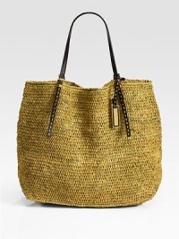 Lightweight and roomy, this chic carryall is crafted from finely-woven raffia and topped with rich leather handles.Double top handles, 9½ dropGoldtone logo tag20W X 14½H X 7DImported Lightweight and roomy, this chic carryall is crafted from finely-woven raffia and topped with rich leather handles.Double top handles, 9½ dropGoldtone logo tag20W X 14½H X 7DImported