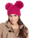 Have some fun when the cold weather sets in with this playful knit hat from Collection XIIX that's topped off with two pretty pom poms.