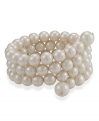 Four is better than one, especially when it comes to stacking on rows of jewelry. Coil bracelet by Carolee features four rows of lustrous glass pearl (10-12 mm) meant to snake delicately around your wrist. Stretches to fit wrist. Crafted in mixed metal. Approximate diameter: 2-1/4 inches. Four is better than one, especially when it comes to stacking on rows of jewelry. Coil bracelet by Carolee features four rows of lustrous glass pearl (10-12 mm) meant to snake delicately around your wrist. Stretches to fit wrist. Crafted in mixed metal. Approximate diameter: 2-1/4 inches.