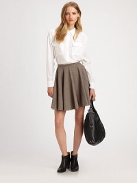 Pleated houndstooth skirt in a short a-line silhouette with a slightly frayed hem for a cool play on classics. Invisible back zipperCotton liningAbout 18 long55% cotton/45% woolDry cleanImportedModel shown is 5'10 (177cm) wearing US size 2. Pleated houndstooth skirt in a short a-line silhouette with a slightly frayed hem for a cool play on classics. Invisible back zipperCotton liningAbout 18 long55% cotton/45% woolDry cleanImportedModel shown is 5'10 (177cm) wearing US size 2.