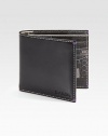 Topstitched leather with a fun, photo printed interior.One billfold compartmentEight credit card slotsLeather4¼W X 3½HMade in Italy