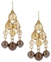 Contemporary chic. Kenneth Cole New York's chandelier earrings are crafted from gold-tone mixed metal, with glass pearls and glass accents coming together for a stunning display. Item comes packaged in a signature Kenneth Cole New York Gift Box. Approximate drop: 2-1/4 inches.