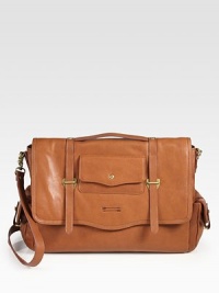 Rich, refined leather in a thoughtfully designed bag with places for all your electronics and room for other essentials.Single top handleDetachable, adjustable shoulder strapFlap strap closeOutside pockets on and under flapInside computer compartment plus side compartment and zip pocketCotton lining16W X 11H X 5DImported Rich, refined leather in a thoughtfully designed bag with places for all your electronics and room for other essentials.Single top handleDetachable, adjustable shoulder strapFlap strap closeOutside pockets on and under flapInside computer compartment plus side compartment and zip pocketCotton lining16W X 11H X 5DImported