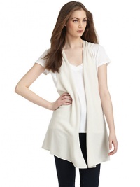 THE LOOKSleevelessRuching at shouldersOpen frontRolled hemSeamed detail at backTHE FITAbout 31 from shoulder to hemTHE MATERIALCashmereCARE & ORIGINDry cleanImportedModel shown is 5'8½ (174cm) wearing US size Small. THE LOOKSleevelessRuching at shouldersOpen frontRolled hemSeamed detail at backTHE FITAbout 31 from shoulder to hemTHE MATERIALCashmereCARE & ORIGINDry cleanImportedModel shown is 5'8½ (174cm) wearing US size Small.