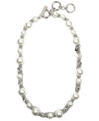 Nothing says sophistication like Givenchy. This elegant style combines shimmering glass pearls and sparkling crystals in a silver tone mixed metal setting. Approximate length: 16 inches + 2-inch extender. Nothing says sophistication like Givenchy. This elegant style combines shimmering glass pearls and sparkling crystals in a silver tone mixed metal setting. Approximate length: 16 inches + 2-inch extender.