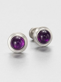 Globe shaped cuff links set with simulated amethyst for an energetic burst of color.Sterling silverSimulated amethystAbout .62 diam.Made in USA