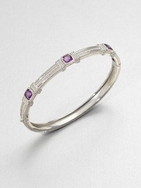 Three cushion-cut amethyst stones set in textured sterling silver. AmethystSterling silverDiameter, about 2.3Hinged, push clasp closureImported Three cushion-cut amethyst stones set in textured sterling silver. AmethystSterling silverDiameter, about 2.3Hinged, push clasp closureImported