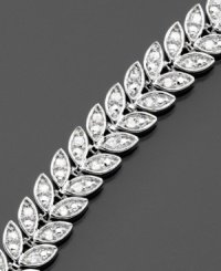 Let your style grow with this lovely and leafy bracelet featuring round-cut diamonds (1/2 ct. t.w.) set in sterling silver. Approximate length: 7 inches. Let your style grow with this lovely and leafy bracelet featuring round-cut diamonds (1/2 ct. t.w.) set in sterling silver. Approximate length: 7 inches.