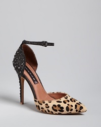 Get wild with STEVEN BY STEVE MADDEN's take on the pointed toe pump trend, pairing leopard print calf hair with glitter and spikes. Get wild with STEVEN BY STEVE MADDEN's take on the pointed toe pump trend, pairing leopard print calf hair with glitter and spikes.