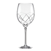 This kate spade new york Annadale iced beverage glass is rendered in sparkling European crystal cut with a swirled design.