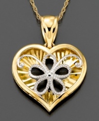 This classic heart pendant is lovingly embellished with a sweet five-petal flower. Crafted in white and yellow 14k gold. Approximate length: 18 inches. Approximate drop: 3/4 inch. This classic heart pendant is lovingly embellished with a sweet five-petal flower. Crafted in white and yellow 14k gold. Approximate length: 18 inches. Approximate drop: 3/4 inch.