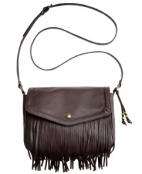 A blast from the past, this hippie-chick inspired design from American Rag is the perfect laid-back look for work or weekend. Flirty fringe and beaded tassels adorn the outside, while interior compartments stash all your essentials with ease. A blast from the past, this hippie-chick inspired design from American Rag is the perfect laid-back look for work or weekend. Flirty fringe and beaded tassels adorn the outside, while interior compartments stash all your essentials with ease.