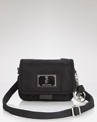 Glamor-girl brand Juicy Couture takes a practical approach to accessorizing with this nylon crossbody bag. Ideally sized for days on the go, it perfects easy-chic style. Glamor-girl brand Juicy Couture takes a practical approach to accessorizing with this nylon crossbody bag. Ideally sized for days on the go, it perfects easy-chic style.