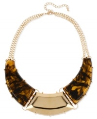 Go for non-stop glam with this Haskell frontal necklace. Pairs acrylic tortoise stones with gold-tone accents for a stunning effect. Crafted in gold tone mixed metal. Approximate length: 17 inches + 3-inch extender. Approximate drop: 1-1/2 inches. Go for non-stop glam with this Haskell frontal necklace. Pairs acrylic tortoise stones with gold-tone accents for a stunning effect. Crafted in gold tone mixed metal. Approximate length: 17 inches + 3-inch extender. Approximate drop: 1-1/2 inches.