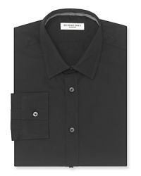Contemporary fit, long sleeve with clean front, no pockets. Button front with point collar, barrel cuffs. Contemporary fit, long sleeve with clean front, no pockets. Button front with point collar, barrel cuffs.