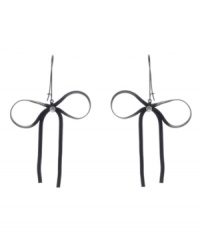 Sleek black bows add an extra touch of edgy style. Betsey Johnson earrings feature a black plated mixed metal setting decorated with sparkling glass stones. Approximate drop: 3 inches. Sleek black bows add an extra touch of edgy style. Betsey Johnson earrings feature a black plated mixed metal setting decorated with sparkling glass stones. Approximate drop: 3 inches.