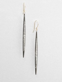 Aptly named, these elongated pod-like strands of oxidized silver are set with graduated rows of dazzling diamonds, tapering as they drop.Diamonds, .40 tcwSterling silver and 14k yellow goldDrop, about 2½Ear wireMade in USA Aptly named, these elongated pod-like strands of oxidized silver are set with graduated rows of dazzling diamonds, tapering as they drop.Diamonds, .40 tcwSterling silver and 14k yellow goldDrop, about 2½Ear wireMade in USA