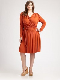 Wrap yourself in style this season with this chic, jersey dress. Featuring a universally flattering silhouette and waist-defining belt, there is so much to love about this design.V-necklineLong sleevesWrap-front designSelf-tie beltAbout 38 from shoulder to hem92% modal/8% spandexDry cleanMade in USA Wrap yourself in style this season with this chic, jersey dress. Featuring a universally flattering silhouette and waist-defining belt, there is so much to love about this design.V-necklineLong sleevesWrap-front designSelf-tie beltAbout 38 from shoulder to hem92% modal/8% spandexDry cleanMade in USA