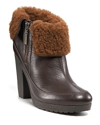 Flipped up or foldsed down, the shearling collar of these leather boots add chic, cozy warmth to winter's chilly days. By Hunter Boot. Flipped up or foldsed down, the shearling collar of these leather boots add chic, cozy warmth to winter's chilly days. By Hunter Boot.