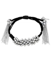 Wrap star! A distinctive wrap silhouette sets apart this stylish bracelet from Betsey Johnson. Featuring an adjustable fabric band, it's embellished with sparkling crystals and multi chain accents. Set in silver tone mixed metal. Approximate length: 7-1/2 inches. Wrap star! A distinctive wrap silhouette sets apart this stylish bracelet from Betsey Johnson. Featuring an adjustable fabric band, it's embellished with sparkling crystals and multi chain accents. Set in silver tone mixed metal. Approximate length: 7-1/2 inches.