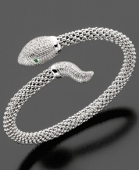 Live dangerously. This stunning diamond bangle bracelet features round-cut diamond (1/4 ct. t.w.) in a sleek sterling silver snake setting. Approximate diameter: 2-1/4 inches. Live dangerously. This stunning diamond bangle bracelet features round-cut diamond (1/4 ct. t.w.) in a sleek sterling silver snake setting. Approximate diameter: 2-1/4 inches.