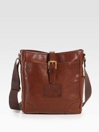 A timeworn vintage quality exudes from this handsome leather bag, exquisitely crafted in soft, supple vachetta leather. Open top with buckled strap Adjustable shoulder strap Exterior, interior pockets Fully lined 11W X 13H X 4D Imported A timeworn vintage quality exudes from this handsome leather bag, exquisitely crafted in soft, supple vachetta leather. Open top with buckled strap Adjustable shoulder strap Exterior, interior pockets Fully lined 11W X 13H X 4D Imported