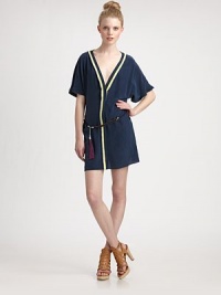 Woven silk in an easy-fit shift crafted with contrast trim and a braided tassel belt.V-neckDropped shouldersShort sleevesConcealed button-down placketAbout 16 from natural waistSilkDry cleanImportedModel shown is 5'10 (177cm) wearing US size Small. Woven silk in an easy-fit shift crafted with contrast trim and a braided tassel belt.V-neckDropped shouldersShort sleevesConcealed button-down placketAbout 16 from natural waistSilkDry cleanImportedModel shown is 5'10 (177cm) wearing US size Small.
