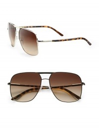 Elegant frames with tubular temples and a metal Prada logo. Available in silver with brown gradient lenses or black with grey gradient lenses. UV 400 lens 100% UV protection Made in Italy Elegant frames with tubular temples and a metal Prada logo. Available in silver with brown gradient lenses or black with grey gradient lenses. UV 400 lens 100% UV protection Made in Italy
