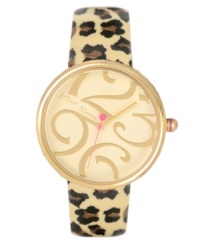 Go on the prowl with this exotic creation from Betsey Johnson. Watch crafted of leopard print leather strap and oversized round gold tone mixed metal case. Champagne dial features large gold-tone numerals, hour and minute hands, signature fuchsia second hand and logo. Quartz movement. Water resistant to 30 meters. Two-year limited warranty.