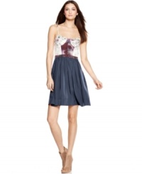 A bustier-style bodice adds a sexy appeal to this otherwise sweet RACHEL Rachel Roy patchwork-inspired A-line dress! A bustier-style bodice adds a sexy appeal to this otherwise sweet RACHEL Rachel Roy patchwork-inspired A-line dress!