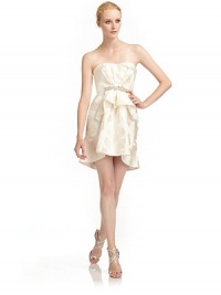 THE LOOKStraplessBoned bodiceFloral jacquardCrystal bead-embellished waistFront rufflesPleated backBack zipperTHE FITAbout 19 from natural waistTHE MATERIALPolyesterFully linedCARE & ORIGINDry cleanMade in USA of imported fabric THE LOOKStraplessBoned bodiceFloral jacquardCrystal bead-embellished waistFront rufflesPleated backBack zipperTHE FITAbout 19 from natural waistTHE MATERIALPolyesterFully linedCARE & ORIGINDry cleanMade in USA of imported fabric