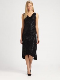 Shimmering sequins create a charming effect for this silk dress with a feminine dipped hem.Draped necklineSleevelessAllover sequinsDipped hemAbout 41 from shoulder to hemMerino woolDry cleanImportedSIZE & FIT Model shown is 5'10½ (179cm) wearing a US size Small. 